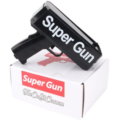 China Toy Amazon Hot Sale Electronic Toys Money Battery Operated Gun Slingshot Gun Paper Game Children for sale