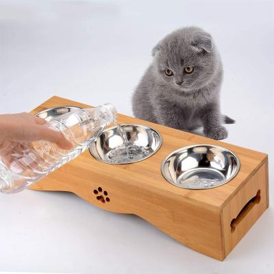 China Sustainable wooden bamboo pet food bowl stand with 3 Stainless steel Bowls for sale