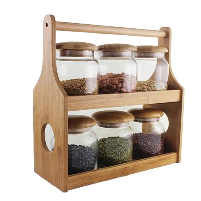 China Sustainable Factory Direct Bamboo 2-tier 4-Canisters Food Glass Jars Storage Rack For kitchen accessories for sale