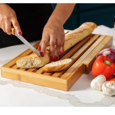 China Sustainable Eco-friendly Cutting Serving Board Wholesale Bamboo Bread Slicer with Knife and Crumb tray for sale