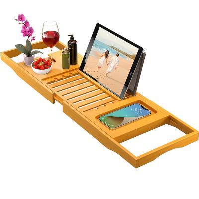 China Sustainable Luxury adjustable bamboo bathtub caddy With Extending Sides and Wine Holder for sale