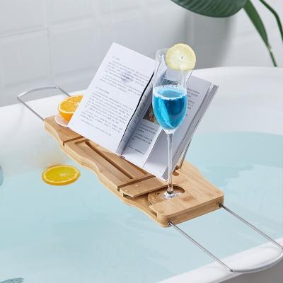 China Sustainable Bamboo Bath tub rack BathtubTray wholesale with Extendable Arms for sale