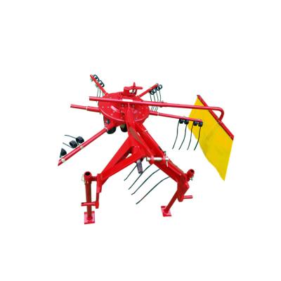 China Home Use Hay Wheel Lawn Mower Rotary Tractor PTO Hay Rake Tedder for sale