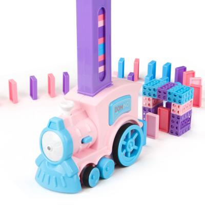 China Slot Toy Pink Domino Train 80PCS Blocks Collect Electric Model Toy Set Macaron Color Train With Lights And Sounds Building Toys for sale