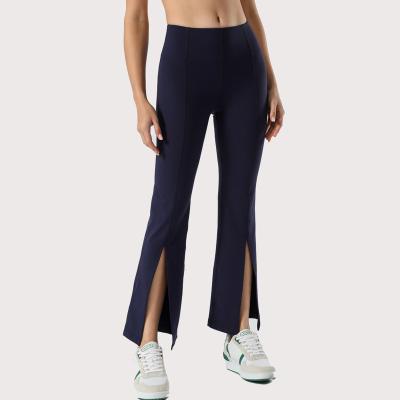 China New Design Breathable Logo Fitness Sports Yoga Pants Custom Lady Stylish Long Pants Solid Color Open Fork Flared Pants for sale