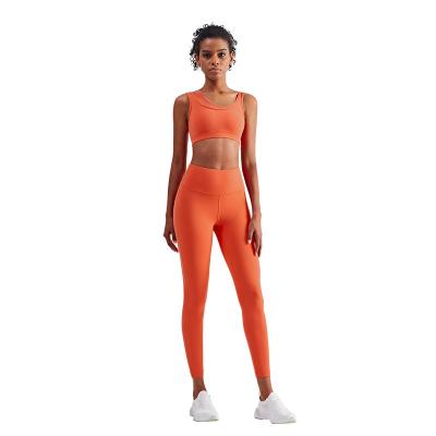 China Breathable Ready To Ship Women Matching Solid Colors Feeling Nude Bra Leggings Gym Sports Bodybuilding Yoga Set Outfit Wear Clothing for sale