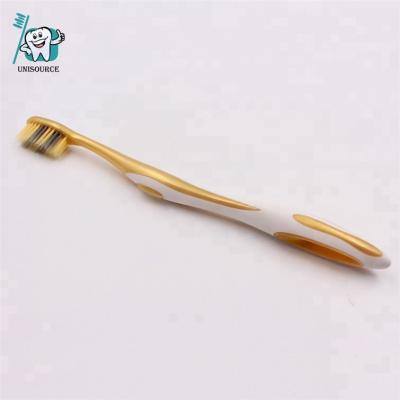 China High Quality Charcoal Single Bristle OEM Adult Toothbrush Special Needs Customized Toothbrush With Gold Bristle for sale