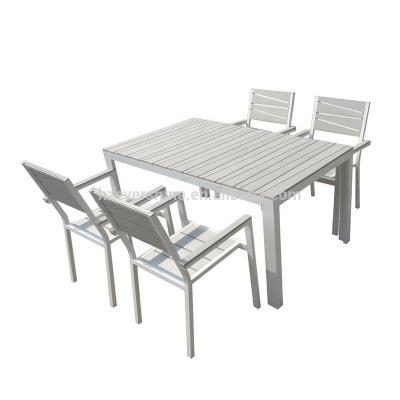 China Strong Elegant Furniture K.D Structure All Weather Resistant Durable Table And Stackable Chairs Garden Dining Sets for sale