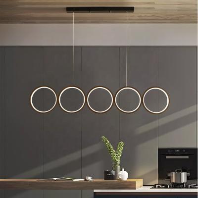 China Minimalist Modern Hotel Lobby Bar Counter Reception Desk Circle Decorative Lighting Home Restaurant LED Ring Pendant Lights Chandeliers for sale