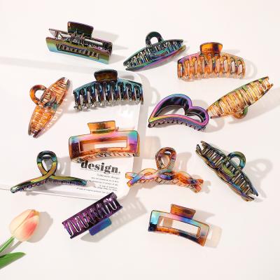 China Wholesale Fashion RARA 10.7CM Fashion Hair Accessories Women's Skeleton Hair Clip Laser Plastic Hair Claws for sale