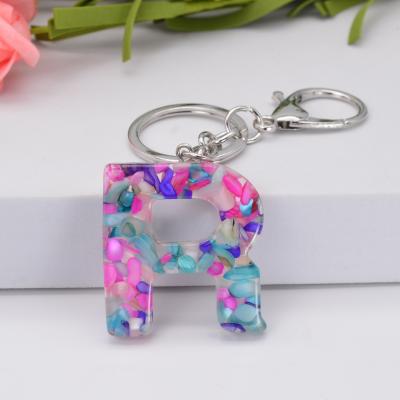 China Fashion Resin Key Chains Elegant 26 Letter Gift Bag Chain Key/Decoration Tortoise Custom Color RARA Bag Chain Custom Made for sale