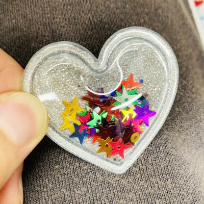 China Custom 3D PVC Or TPU Sequin Inflatable Label Glitter Patch For Garment Handbag Hat for sale