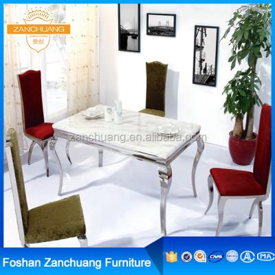 China Super Comfortable Modern Artificial Marble Stainless Steel Dining Table for sale