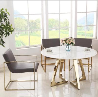 China Bedroom Luxury Stainless Steel Dining Chair PU Fabric Gold Seat for sale