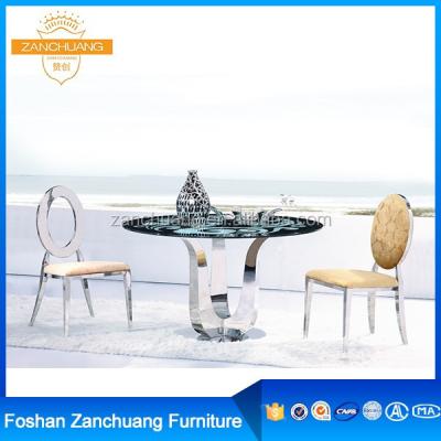 China Super Comfortable Tulip Stainless Steel Artificial Marble Stone Base Top Dining Table for sale