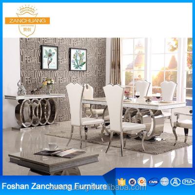 China Easy To Clean Modern Dining Room Furniture 6 Chair Covers One Person Dining Table In White for sale