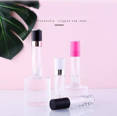 China Empty Lip Gloss Cosmetics 6.4ml Lip Gloss Tube Black Pink Purple Tube for sale