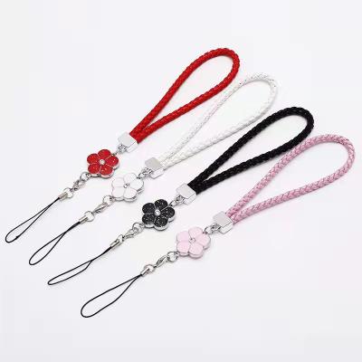 China Creative Flower Braided Leather Strap Lanyard Wrist Strap Phone Hand Hanging Short Strap For Mobile Phone Strap 2021 for sale