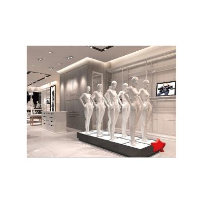 China Commercial Women Shop Metal Garment Display Wall Stainless Steel Boutique Clothing Racks Show Customized for sale