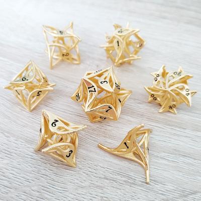 China New Board Game Accessories Golden Dungeons and Dragons DnD TRPG COC Board Game Metal Hollowed-out Die Set for sale