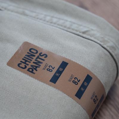 中国 Small S M XL XXL waterproof transparent clothing labels self-adhesive sticker for clothing collar 販売のため