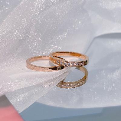 China Rose Gold Stainless Steel Couples Rings Engagement Love Numeral Ring Non Fade Roman Diamond Ring Men Women CLASSIC fashion 2pcs double for sale