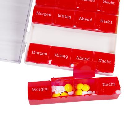 China Eco-friendly Weekly Pill Organizer High-Quality Portable Pill Box Red Seven-Day Pill Storage Case With Braille for sale