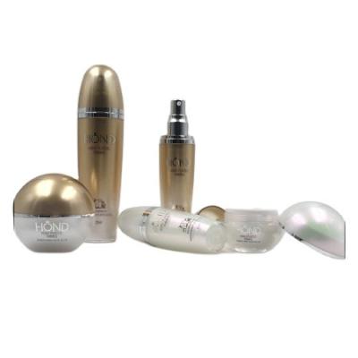 China wholesale luxury round ball acrylic bottle cosmetic bottlepearl gold color cosmetic bottle lotion bottle for sale