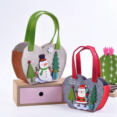 China Christmas Cute Holiday Decorations Customizable Nonwoven Fabric Bags Gift Candy Basket Tote Bags for sale