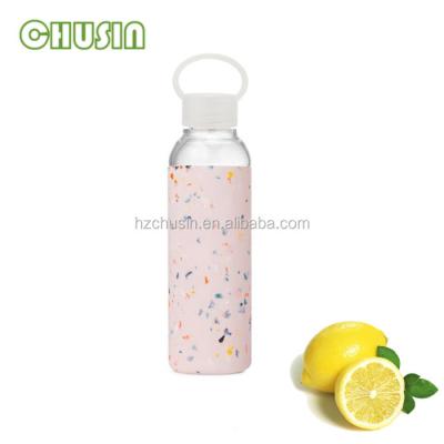 China Sustainable concrete was studded with bits of colored stone glass water bottle for sale