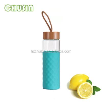 China Sustainable Glass Sports Water Drinking Bottle With Silicone Sleeve for sale