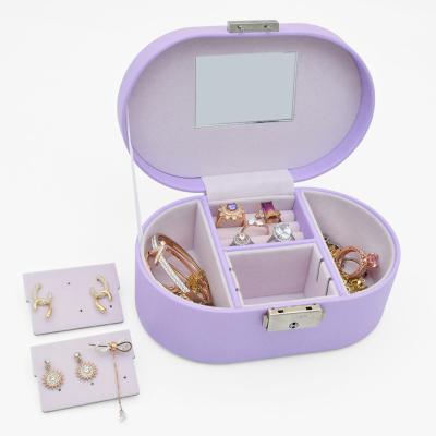 China Newest Fsahion Purple PU Leather Travel Small Earring Jewelry Organizer Case Jewelery Storage Care Box With Mirror for sale