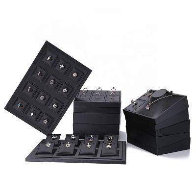 China Stackable Jewerly Storage PU Leather Ring Display Tray Black Tray Case Earrings Jewelery Counter Stand Jewelry Display Stand for sale