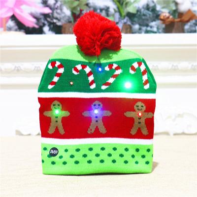 China Warm Christmas Pom Pom Knit Hats Winter Led Headwear Christmas LED Flashing Light Beanie Hat Led for sale