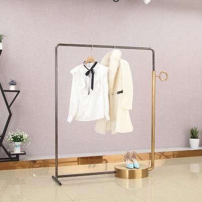 China Wall Mounted Modern Black Metal Showroom Retail Metal Clothing Store Display Stand for sale