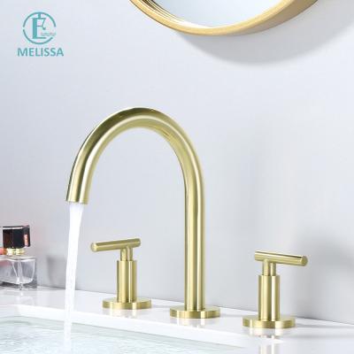 China Sense Faucets Melissa Brass Bathroom Fashion Brushed Gold Split Type 3 Holes Basin Bathroom Cabinet Hot And Cold Faucet for sale