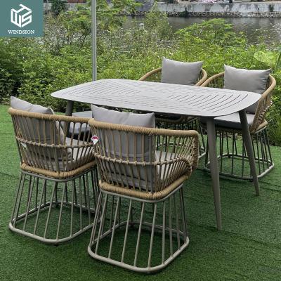 China Modern 5 pieces  Rattan garden furniture outdoor dining table and chair set for sale