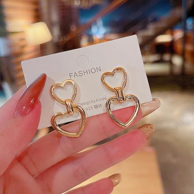 China 2021 New CLASSIC Silver S925 Needle Hollow Love Dangle Simple Drop Earring Earrings Heart Shape Jewelry For Women Fashion for sale