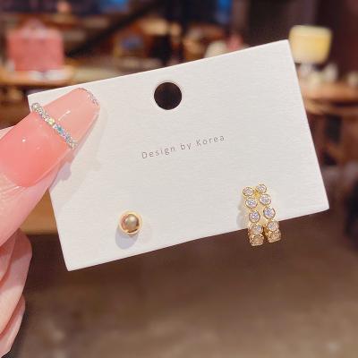 China CLASSIC 2021 New Design Inlaid Asymmetrical Stud Earrings Shiny Zircon Earring Boho Metal Jewelry For Women Trend Fashion for sale