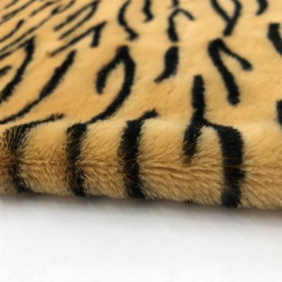 China Anti-static printed PV plush fabric for clothing toys toy tiger hometextile fabric for sale