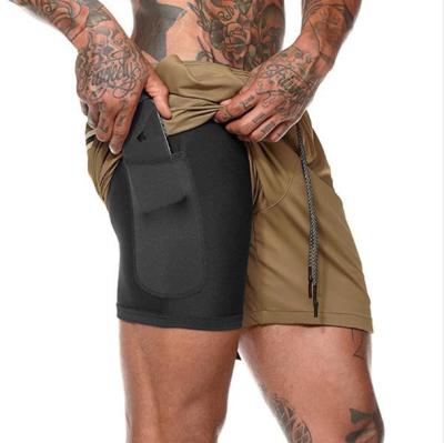 China Anti-Wrinkle Dongguan Factory Summer Men Gyms Fashion Fitness Shorts Bodycon Joggers Quick Dry Cool Short Pants Beach Casual Sweatpants for sale