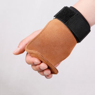 China Breathable Leather Lightweight Wear-Resistant/High Elastic Brown Cowhide/Comfortable Thicken Wrist Palm Support Barbell Train Cattle Hide Hand Brace With Sponge Pad for sale