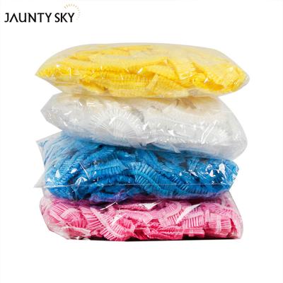 China Custom Viable 100Pcs Waterproof Elastic Clear Travel Thickening Salon Travel Hotel Plastic Disposable PE Shower Cap Disposable Hat for sale