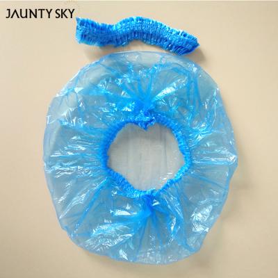 China Custom Viable 100Pcs Waterproof Elastic Clear Travel Thickening Salon Travel Hotel Plastic Disposable PE Shower Cap Disposable Hat for sale