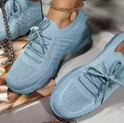 China Fashion Trend Wholesale Flying Weaving Women's Shoes Lightweight Breathable Couples Shoes Sports Running for sale