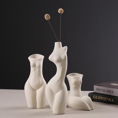 China Mid Century Modern Home Decor Flower Vase Illustration Customized Body Ceramic White Vase for sale