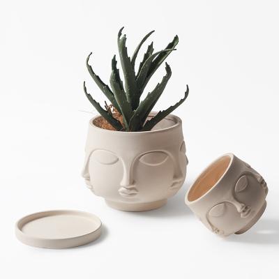 China Modern Handmade Sets Of Round Shape White Ceramic Flower Face Planter for sale