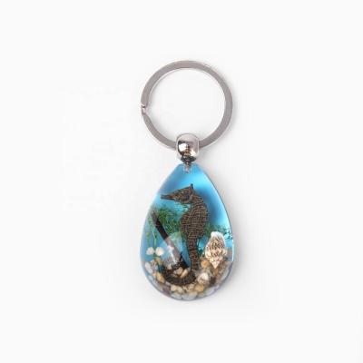 China Hot Selling Water Drop Marine Theme Souvenir Blue Color Resin Key Chain for sale