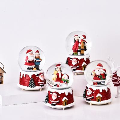 China Artificial Mall Hot Sale Indoor Christmas Decoration Resin Opens Cartoon Glass Water Ball Music Box Snow Globe for sale