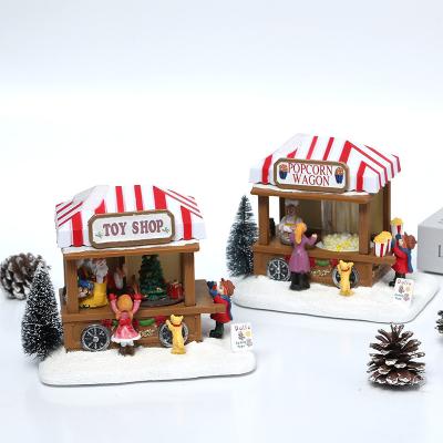 China Wholesale Artificial Christmas Decoration Gifts Custom Resin Opens Christmas Booth With Lights Music Box for sale